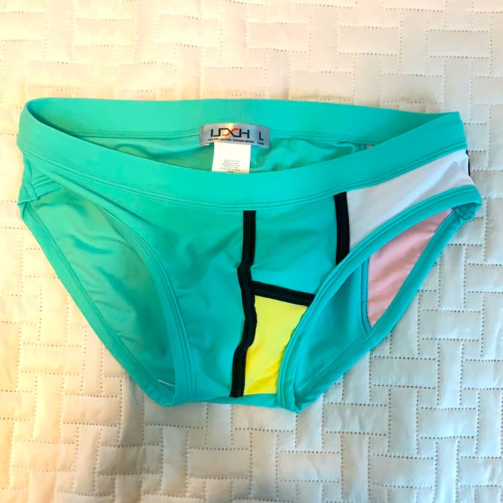 Men’s UHX swim brief size L fits like medium
